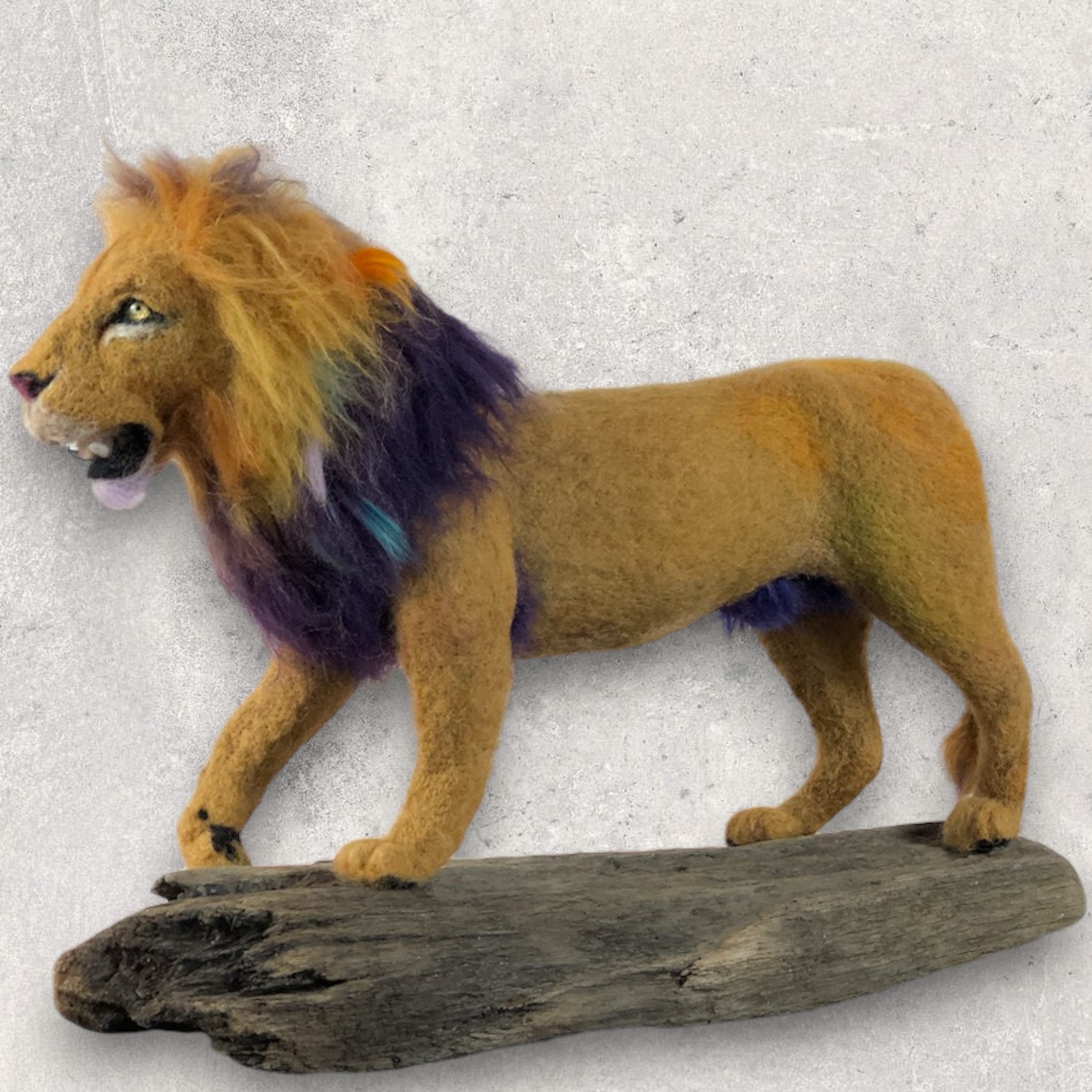 Lion walking under the evening sunset sculpture